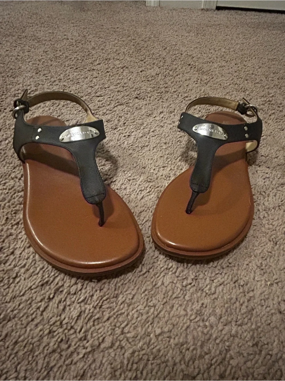 Michael Kors Women’s Black T-StrapFlat Sandals Silver Logo Buckle (Size 9)